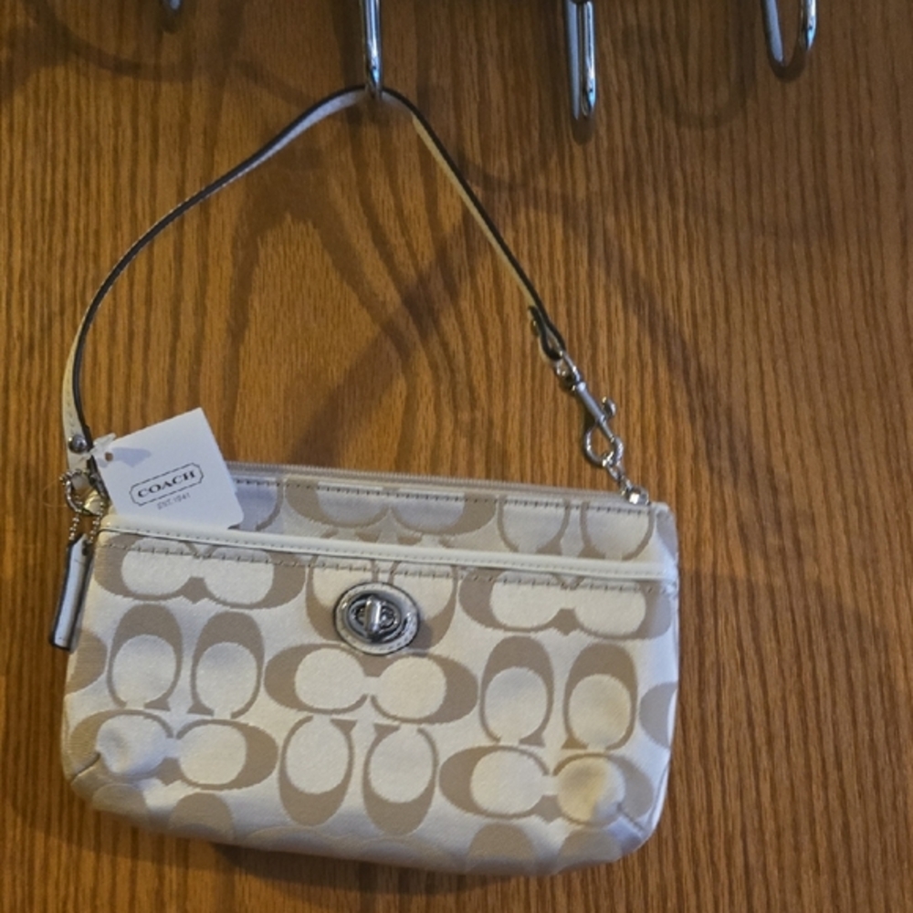 Small Coach Cream and Tan Clutch with Signature Monogram